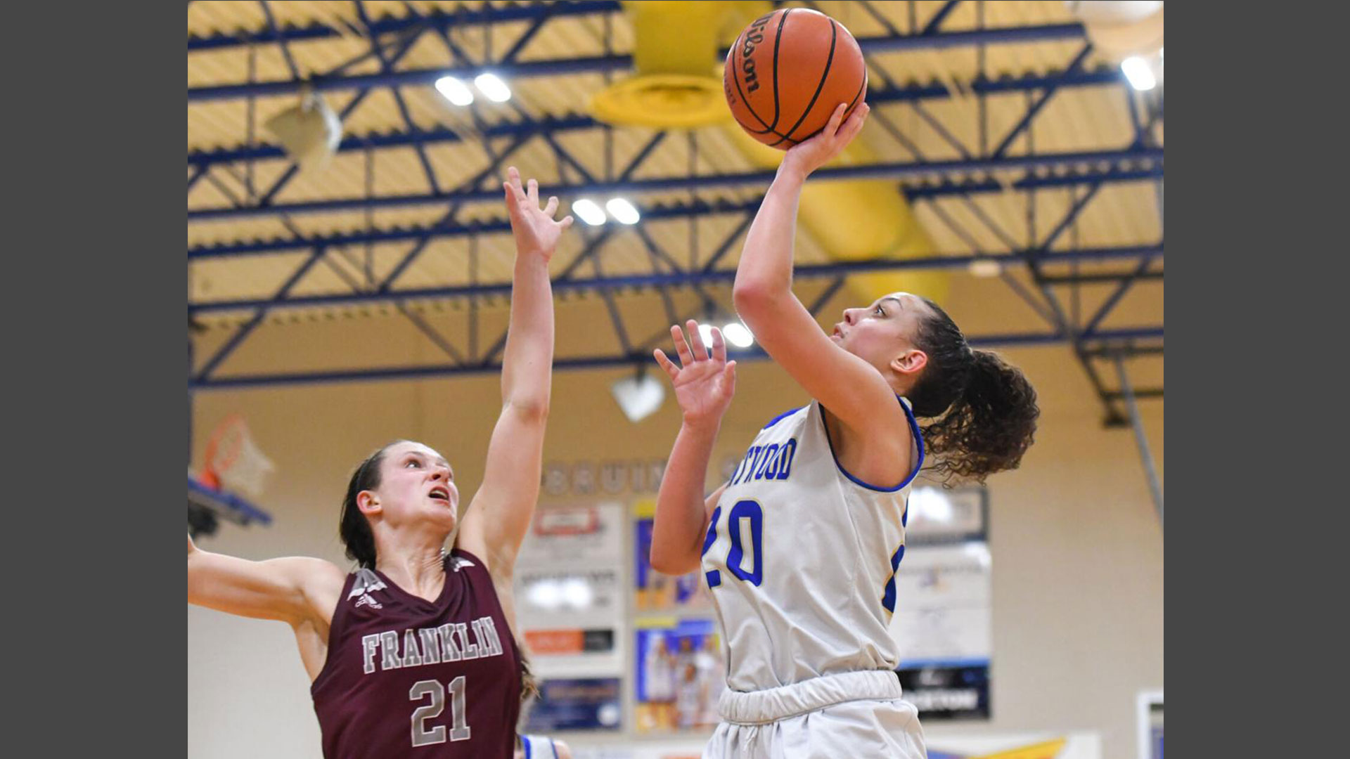 Sydney Ryan glides in for two of her 19 points for Brentwood as Franklin's Brenna Swiger defends Tuesday, Jan. 19, 2021 in Brentwood. The Lady Bruins captured a 59-31 District 11-AAA win. Photo by Charles Pulliam